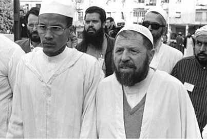 عباس مدني الزعيم التاريخي لجبهة الإنقاذ الإسلامية (على اليمين) وعلي بالحاج، مايو 1991 الجزائر العاصمة.