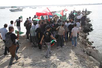 Palestinian youth organize mock funeral for flotilla martyrs