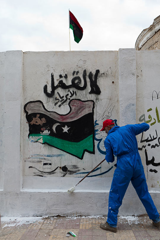 // “No to the killings of innocent” says this piece just off Benghazi’s Freedom Square. The man carefully painted over the wall around the mural, leaving the message intact.