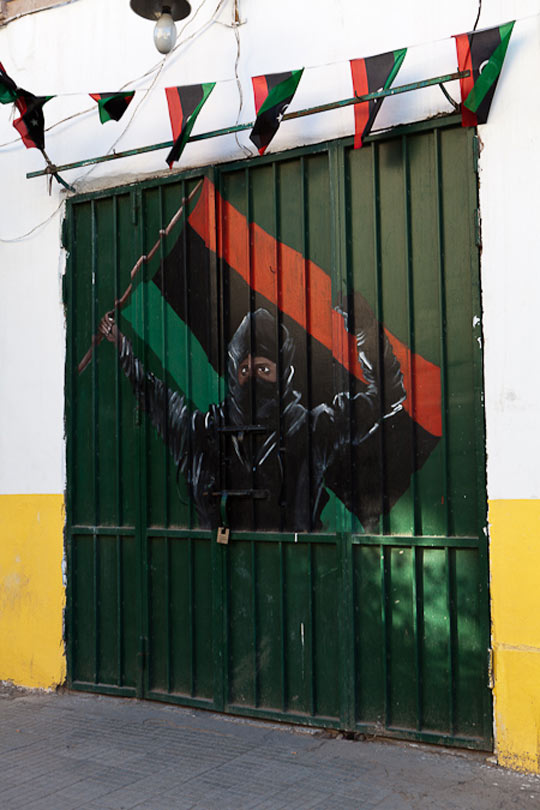 //The green-painted doors were everywhere in Gaddafi’s Libya – green was the official colour of the past regime. Today, they are popular canvases for street artists.