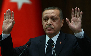 //Prime Minister Erdoğan is struggling to limit the damage after the corruption scandal.