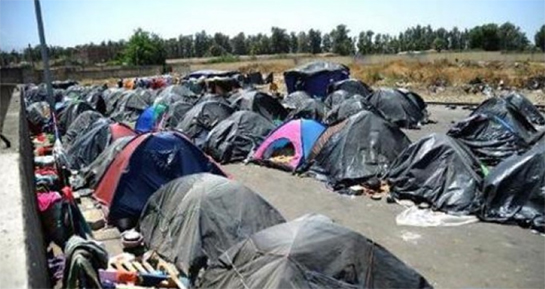 //Un campo di migranti subsahariani a Boufarik, vicino Algeri /AFP